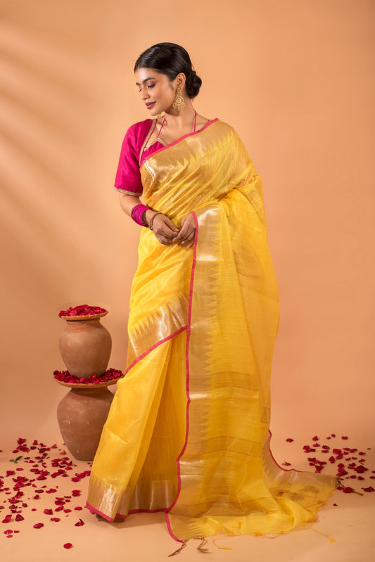 Vasanti – Yellow Kora silk saree with golden zari border and contrast edging, festive Indian saree by Geetanjali Plaza