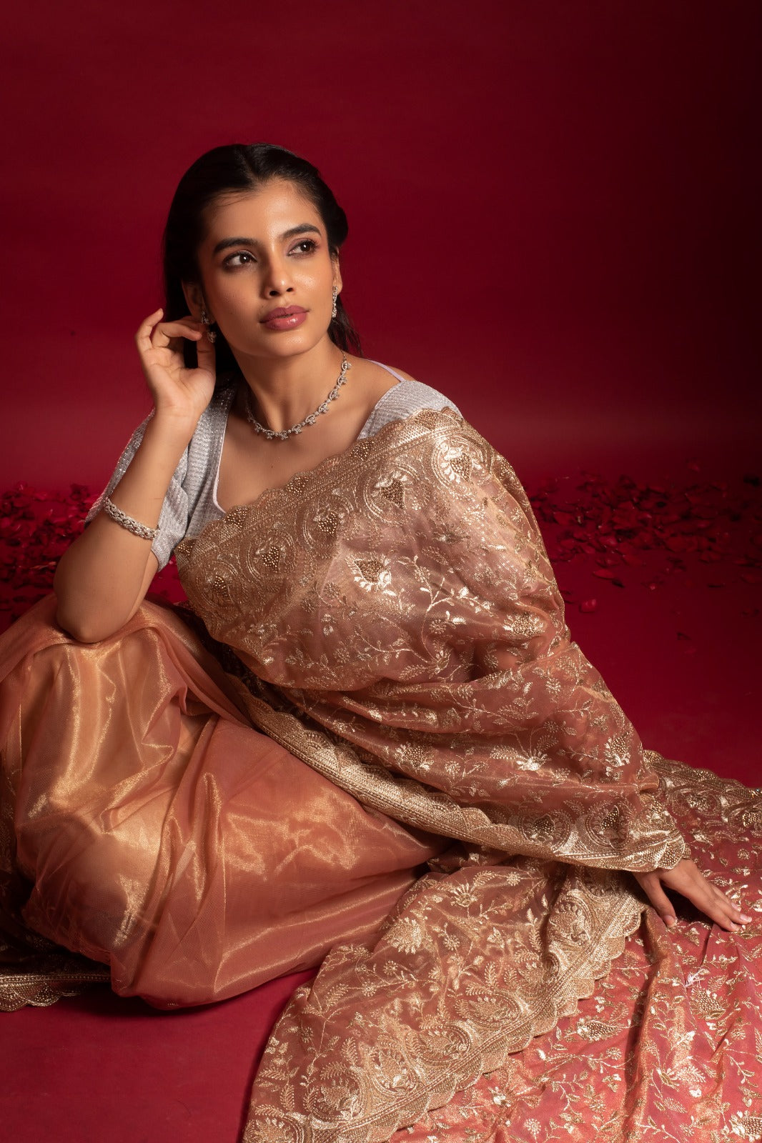 SWARNALEKHA – Pure golden handwoven organza saree with intricate zari floral motifs, evoking royal elegance