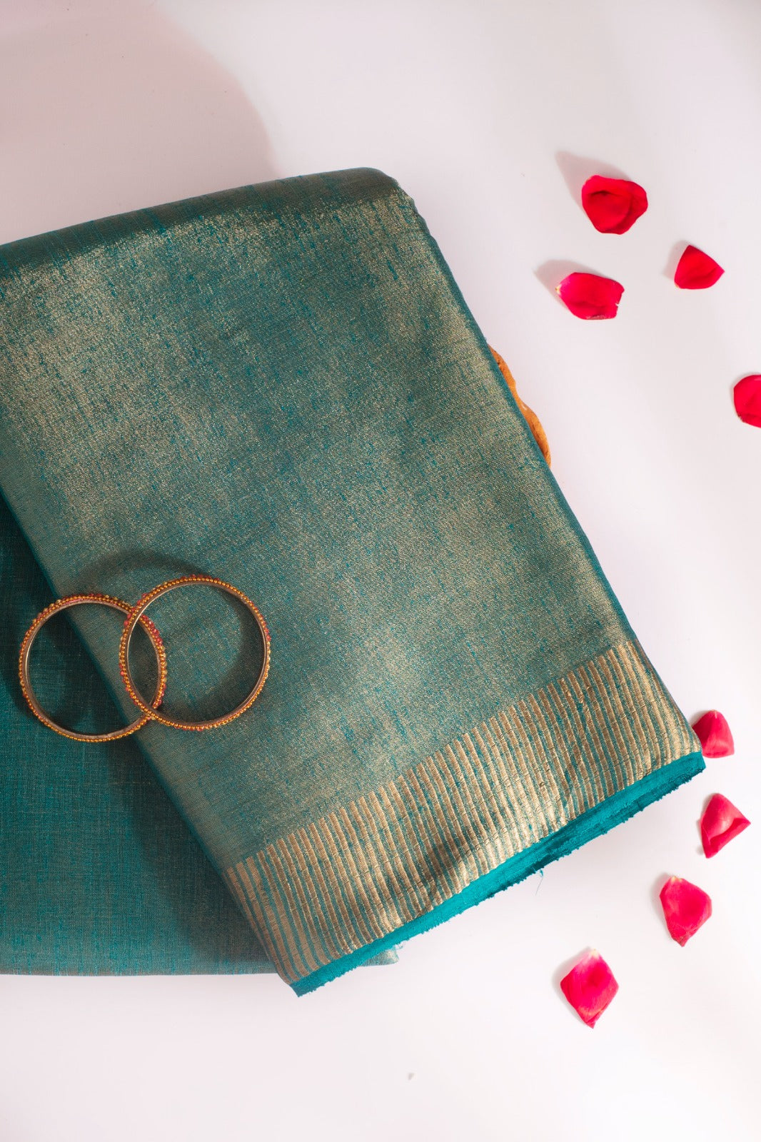 IRAAYA | BOTTLE GREEN PURE TISSUE SILK SAREE