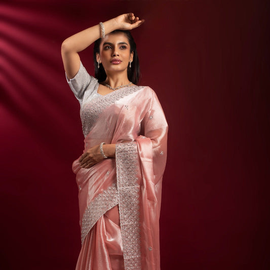 PRAMA – Pastel peach-pink tissue silk saree with silver zari butis and ornate border, Geetanjali Plaza exclusive


